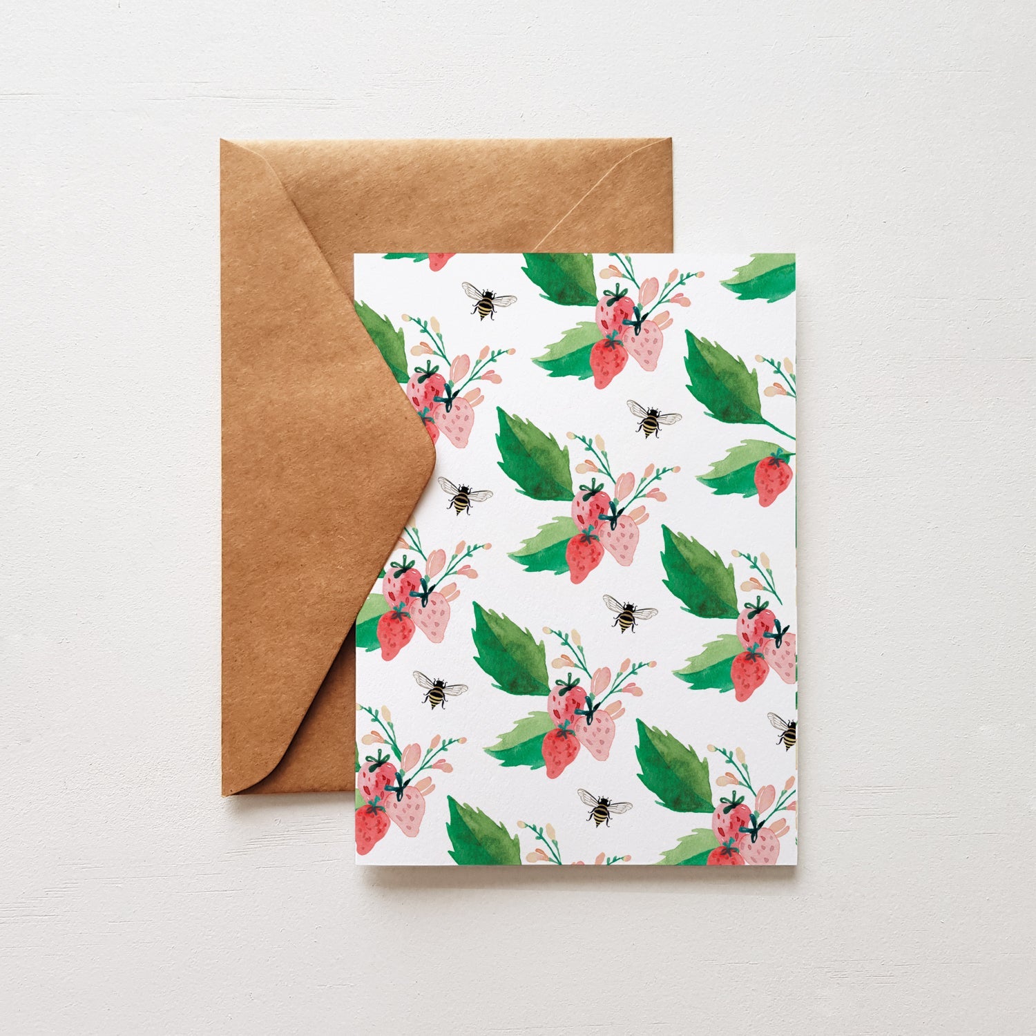 brown envelope with a strawberries and bees pattern card
