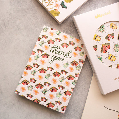 Illustrated thank you card with floral and insect pattern