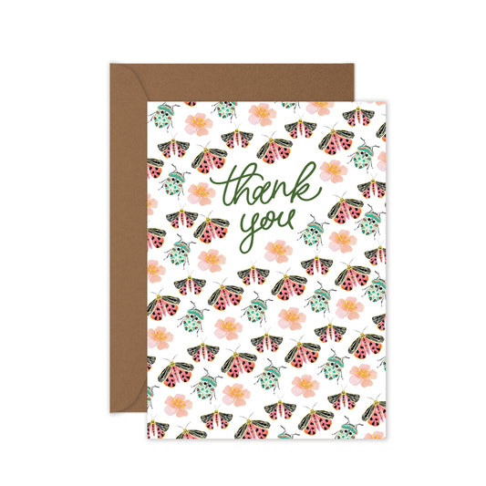 Greeting card with moth, beetle and flower  pattern and 'thank you' text, brown envelope.