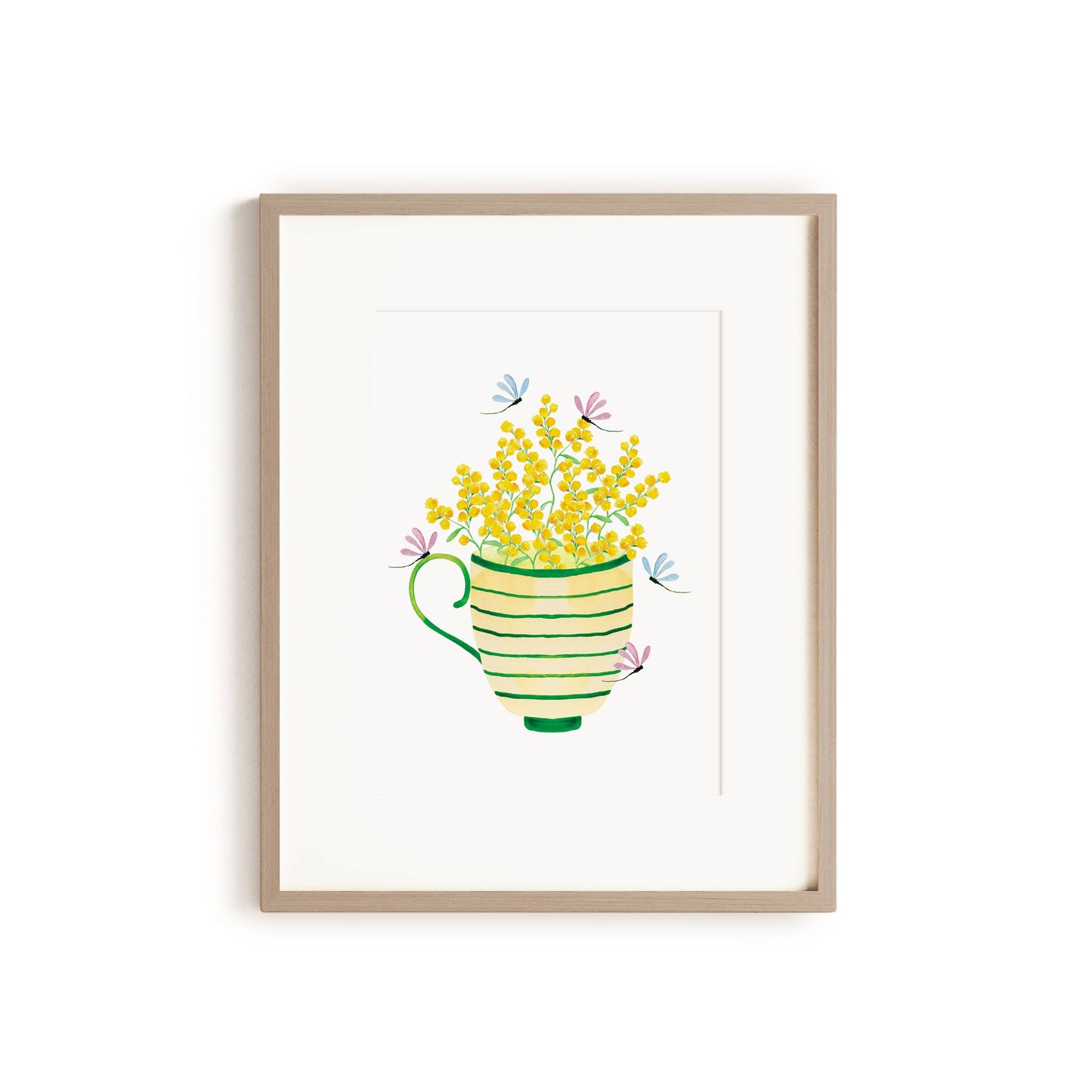 wooden framed artwork with striped tea cup filled with wattle flowers and dragonflies