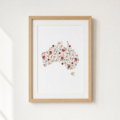 Framed artwork of a floral pattern of a map of Australia on a white background