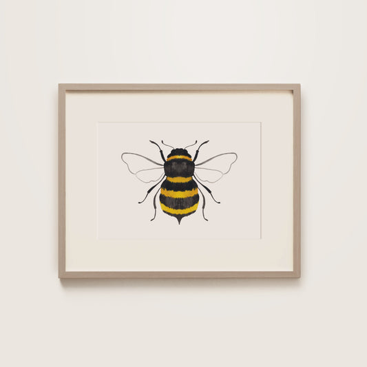 Framed artwork of a bee on a white background
