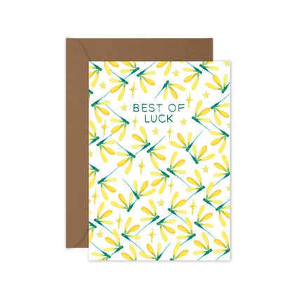 Greeting card with dragonfly pattern and 'Best of Luck' text, brown envelope.