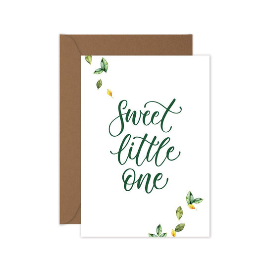 Baby greeting card with green script 'Sweet little one' and leaves on a brown envelope