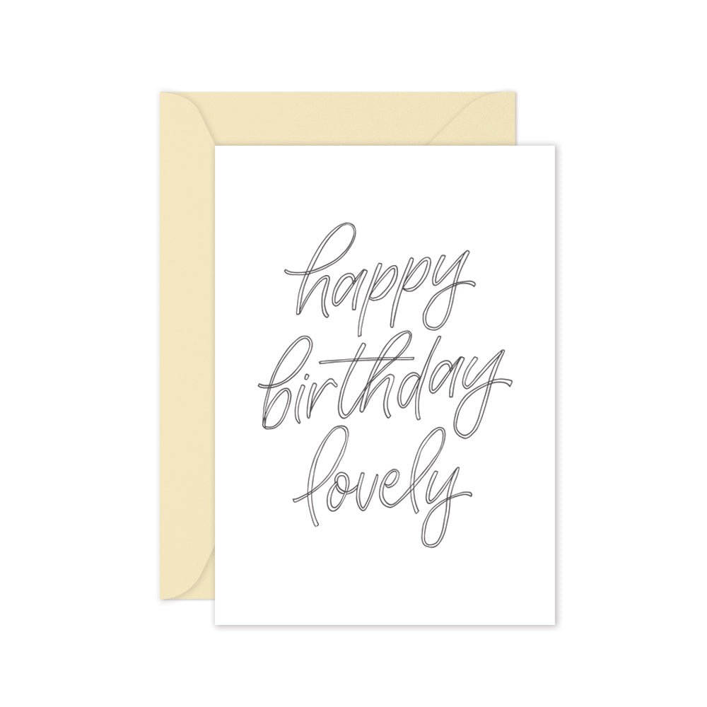 happy birthday lovely greeting card with drak grey script and a cream envelope