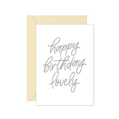 happy birthday lovely greeting card with drak grey script and a cream envelope