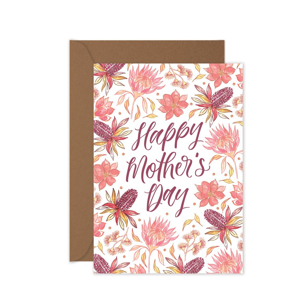 Greeting card with floral design and 'Happy Mother's Day' text, brown envelope.